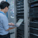 Computer Engineer Is Setting Up Network In Server Room