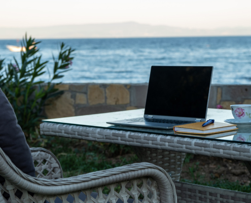 Side View Working From Summer House Remote Concept