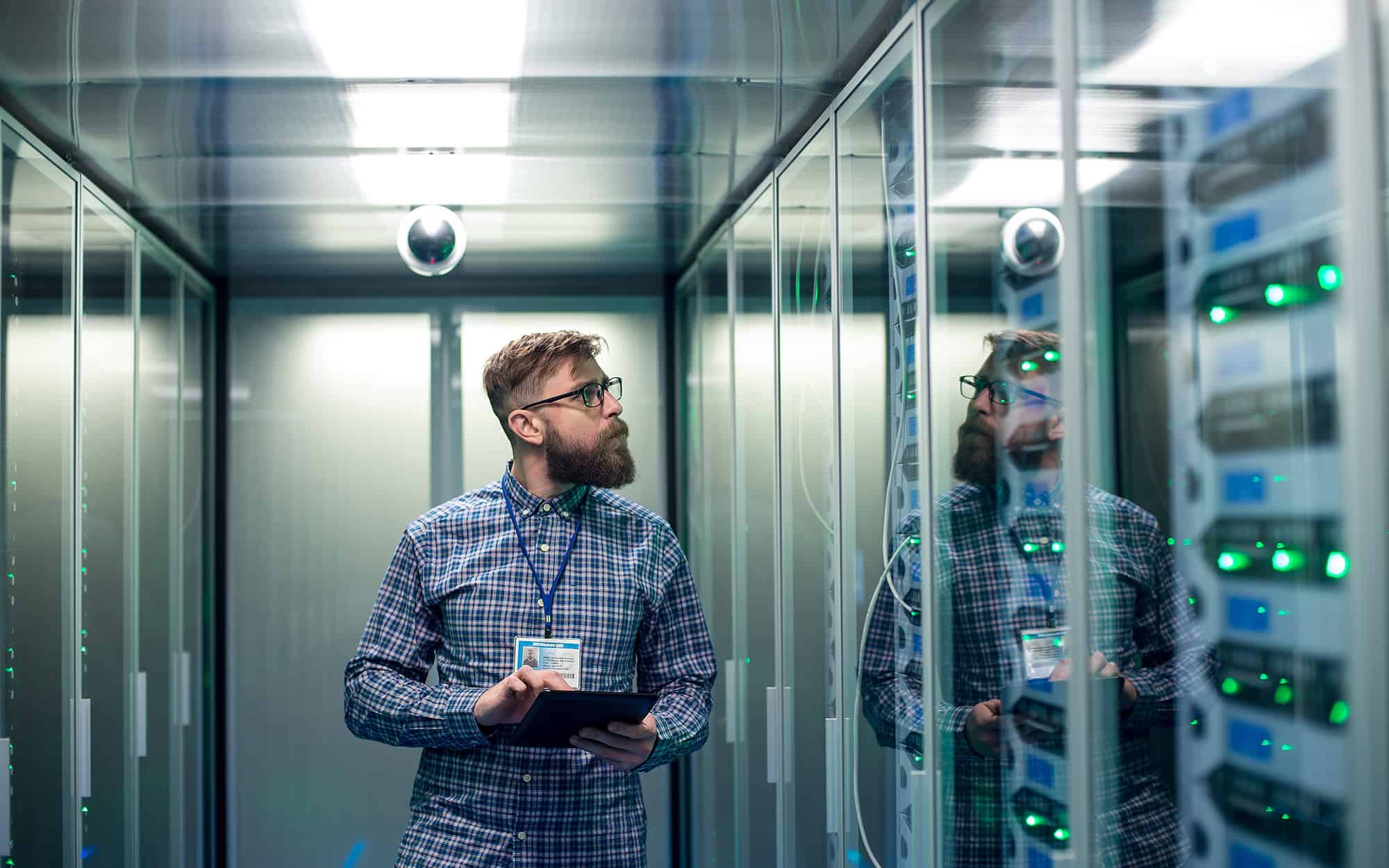 Front View Of Man In Server Room