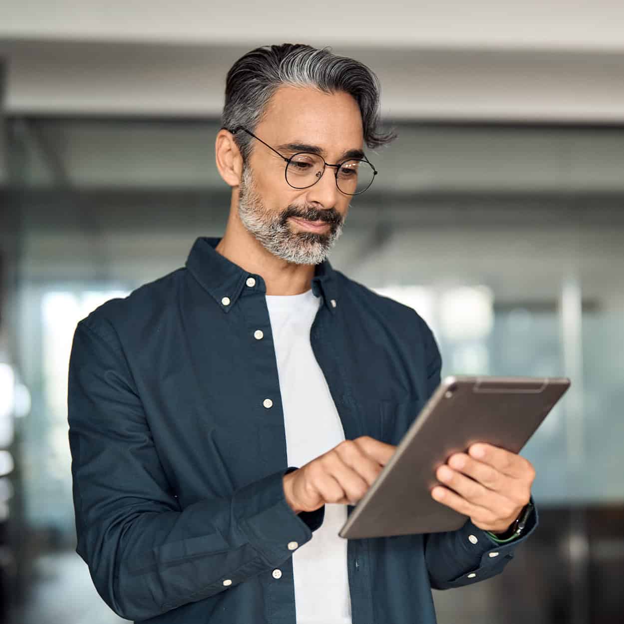 Header Busy Middle Aged Business Man Wearing Shirt Standing In Corporate Office Using Digital Tablet