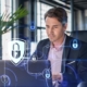 Business person in office using secure laptop