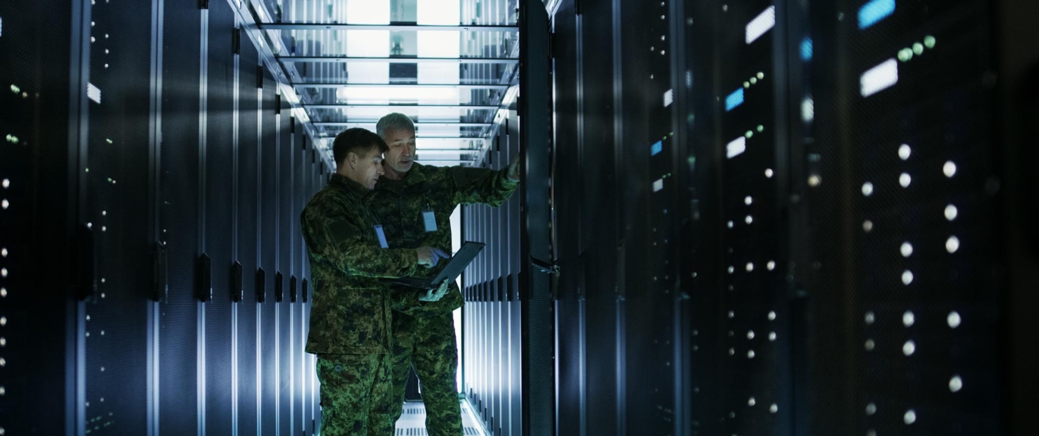 Two People In Uniform In Data Center